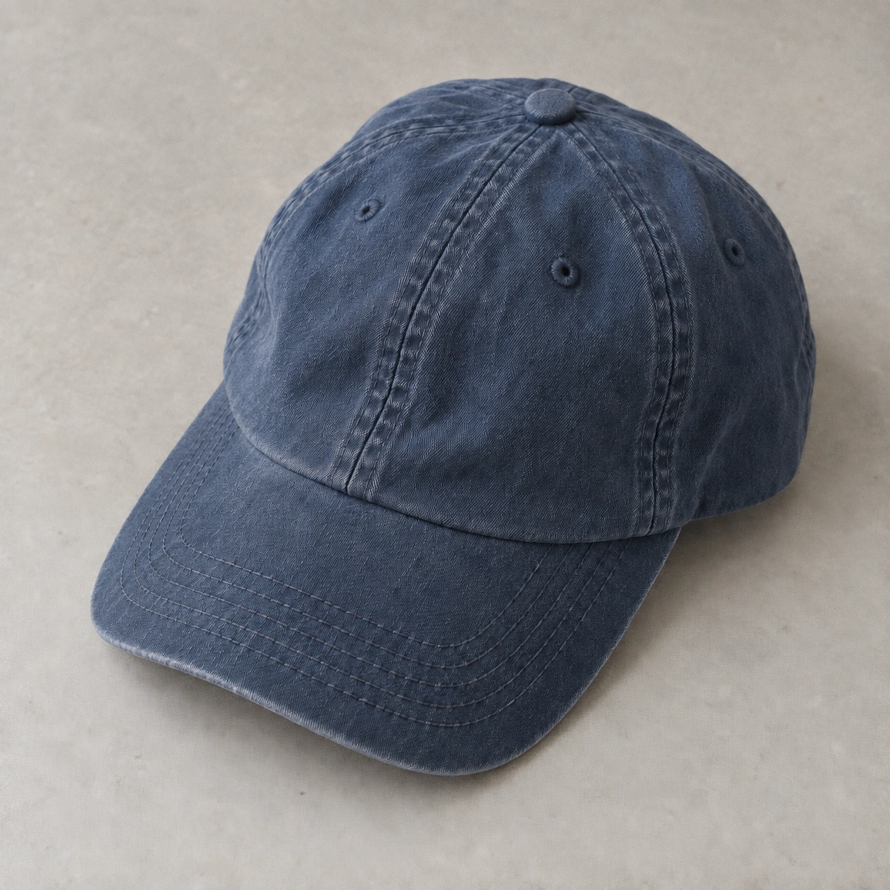 An everyday ink-blue cotton cap with natural fabric texture.