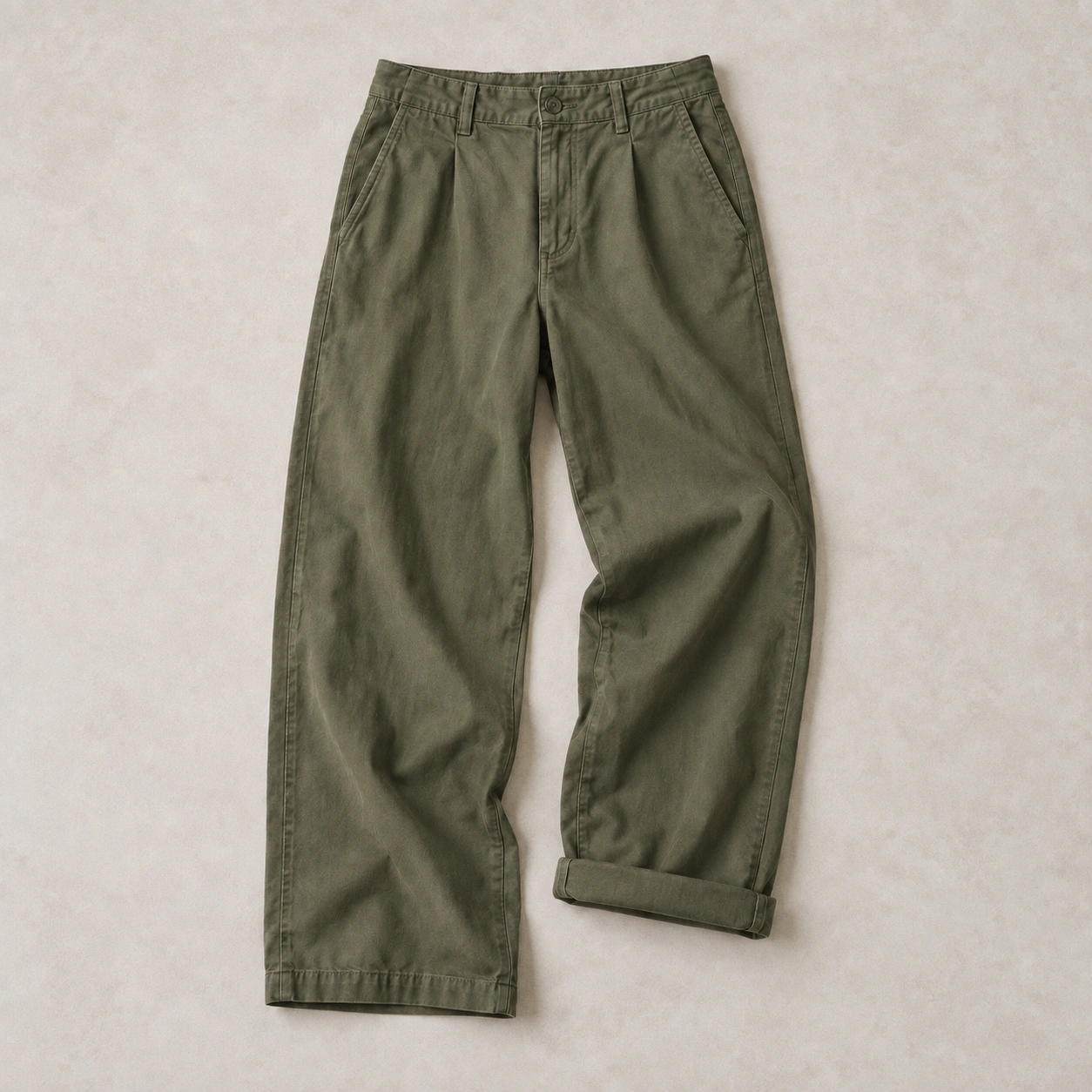 Olive wide-leg cotton trousers with a casually turned-up cuff.